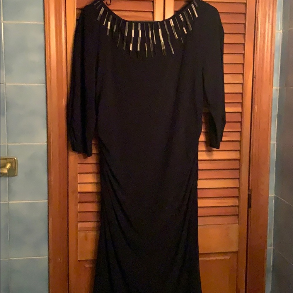 Woman’s navy blue dress